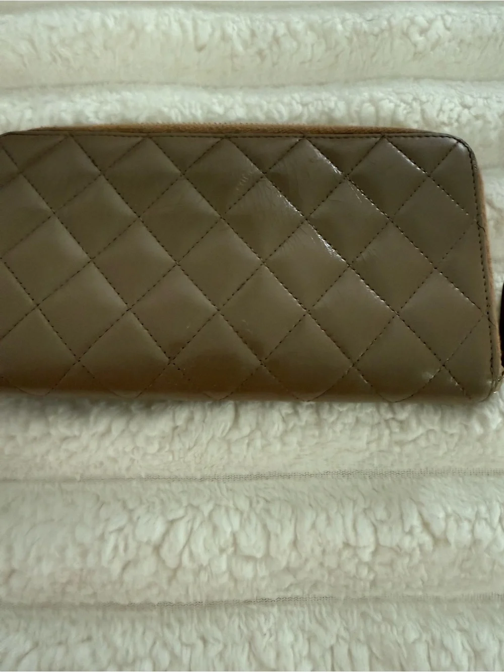 CHANEL Quilted Leather Zip Wallet in Brown with Gold CC